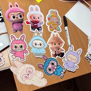 Labubu Characters Vinyl sticker set. Adorable! marker for size reference.